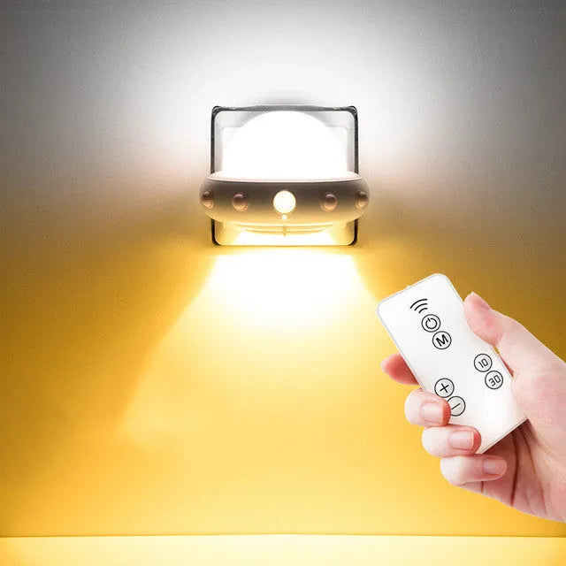 Remote control UFO shaped bedside night light in blue, pink, or white with cartoon design