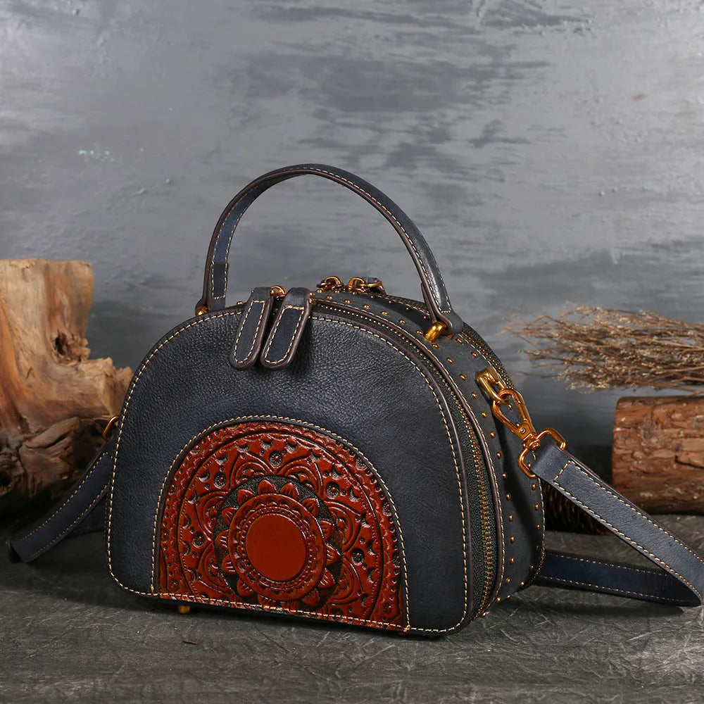Vintage-style suede cowhide leather handbag with multiple internal organisation pockets.