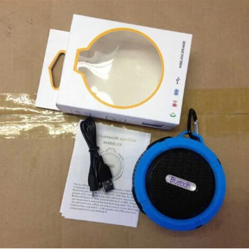 Portable waterproof Bluetooth speaker in multiple colours with bag clip for outdoor use