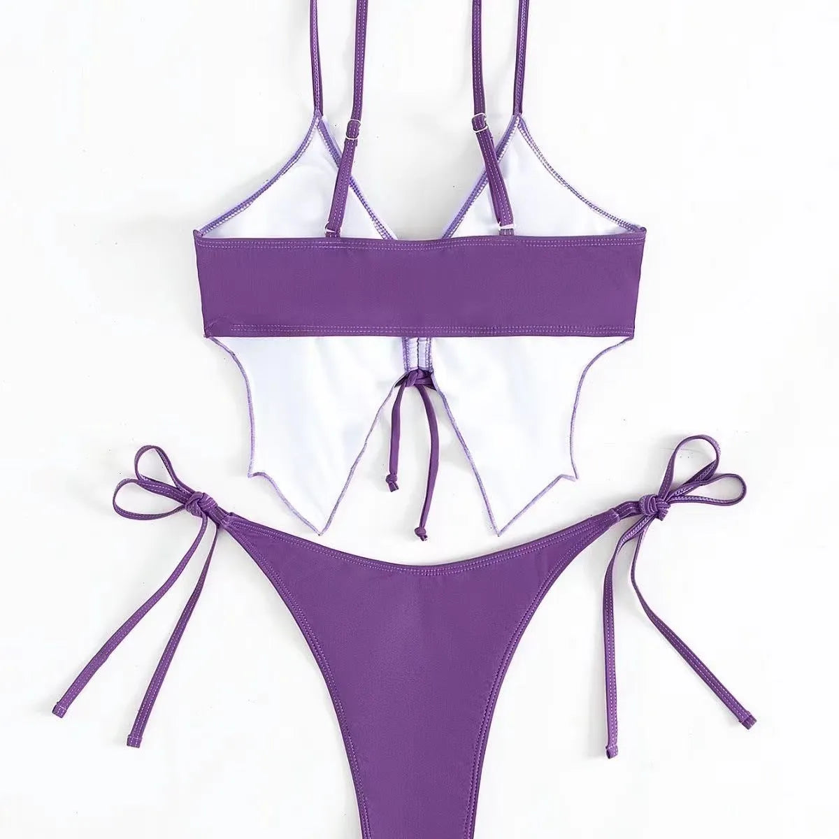 Women's purple bow ins style split bikini set with sleeveless top and briefs for swimming.
