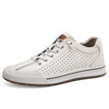 Men's white matte leather casual shoes with round toe and flat sole.