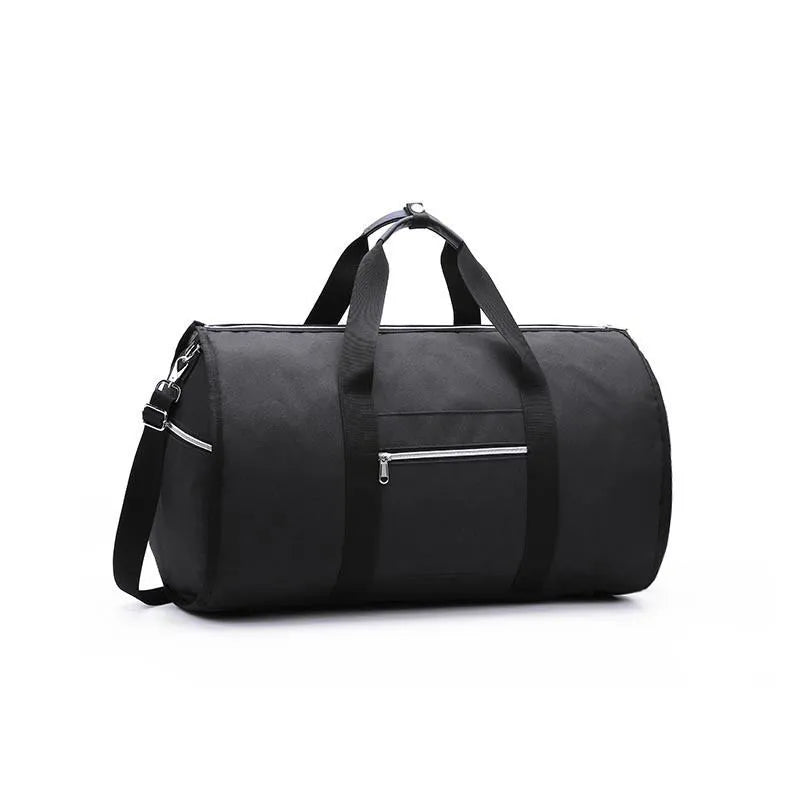 Medium cylinder travel bag in Oxford cloth, shown in black, with zipper open to reveal internal pocket.