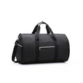 Medium cylinder travel bag in Oxford cloth, shown in black, with zipper open to reveal internal pocket.