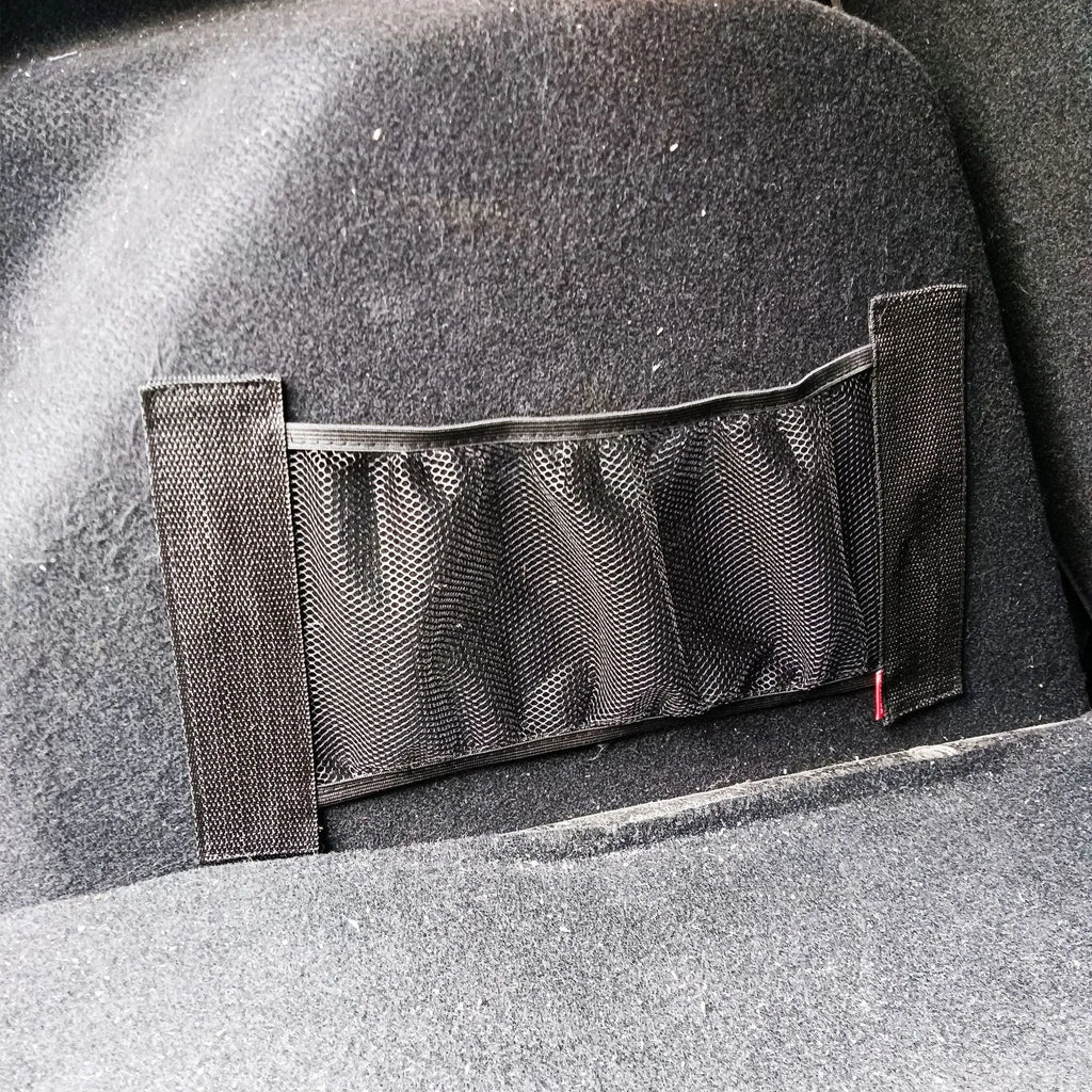 Car trunk elastic storage net in two sizes for organising loose items in vehicle boot