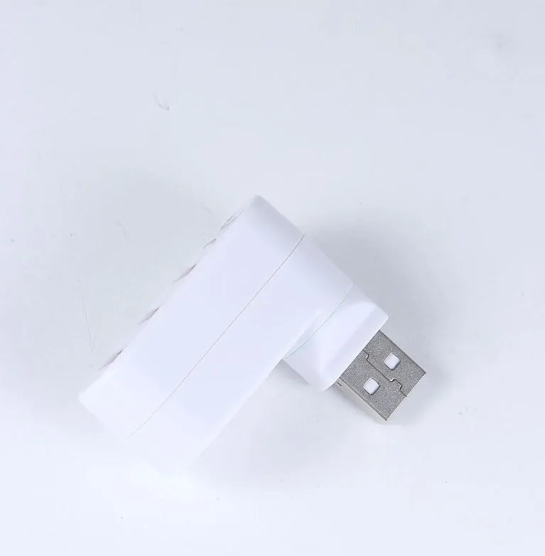 Black and white USB splitter hub showing multiple USB ports for computer connectivity
