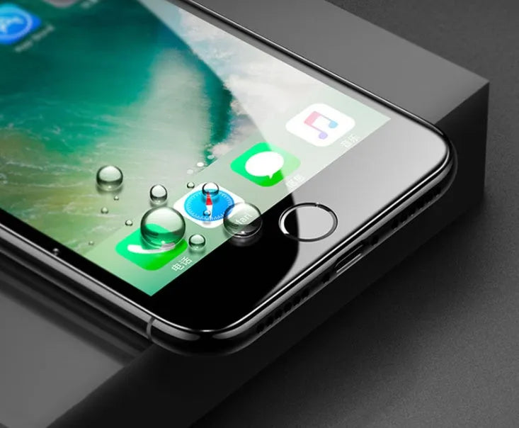 Tempered glass screen protector with carbon fibre edge for iPhone models on a dark surface