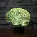 Brain-shaped 3D acrylic LED desk lamp with colour-changing lights on square black ABS base