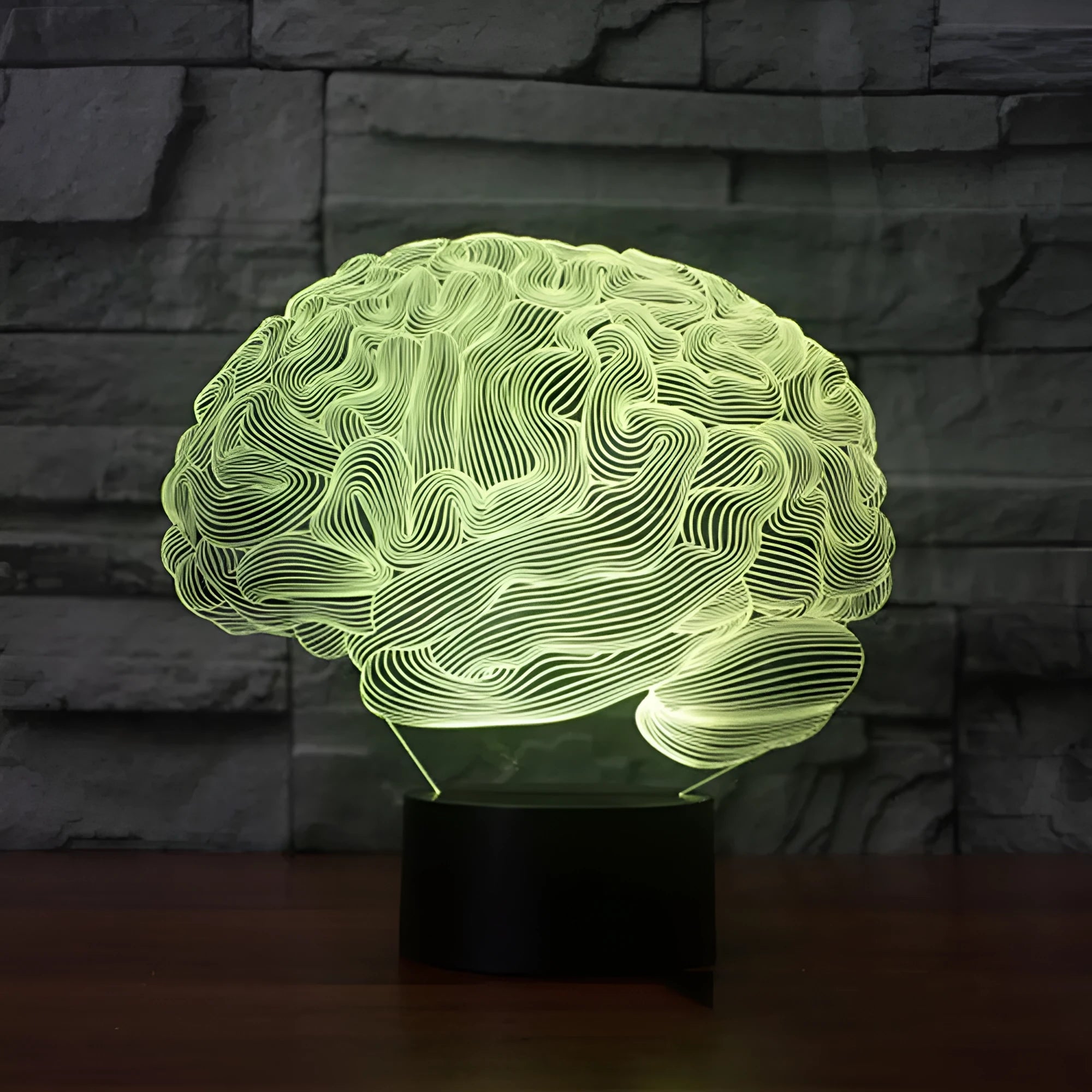 Brain-shaped 3D acrylic LED desk lamp with colour-changing lights on square black ABS base