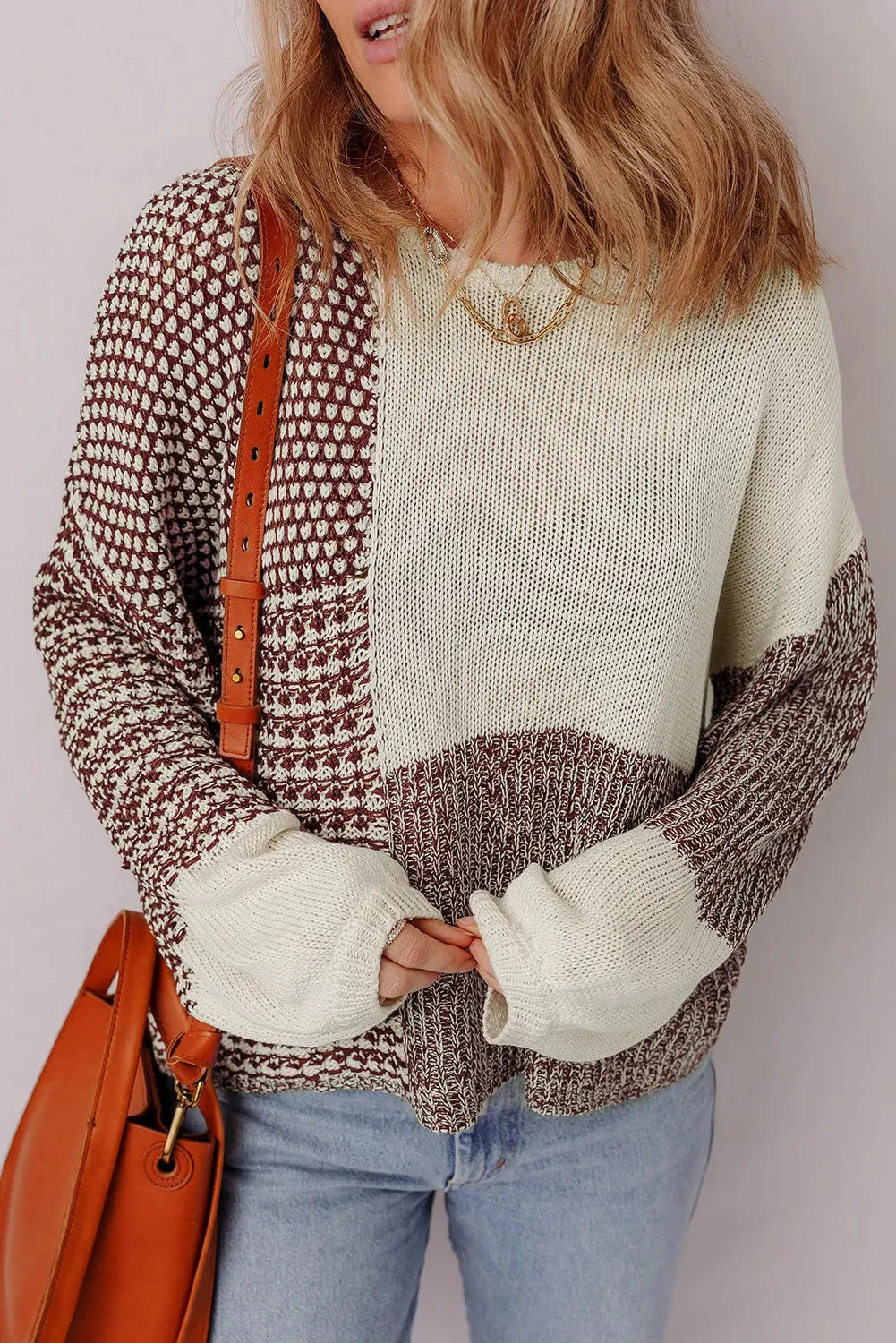 Dark khaki loose sweater with drop shoulders and a back tie fastening.