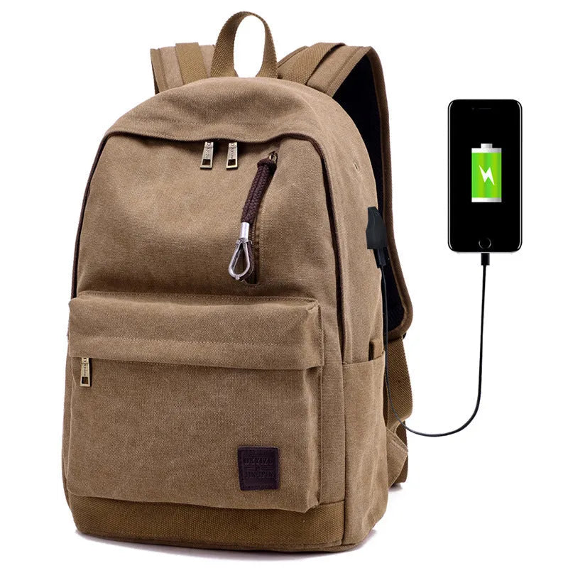 Canvas backpack with USB charging port showing multiple compartments including laptop pocket