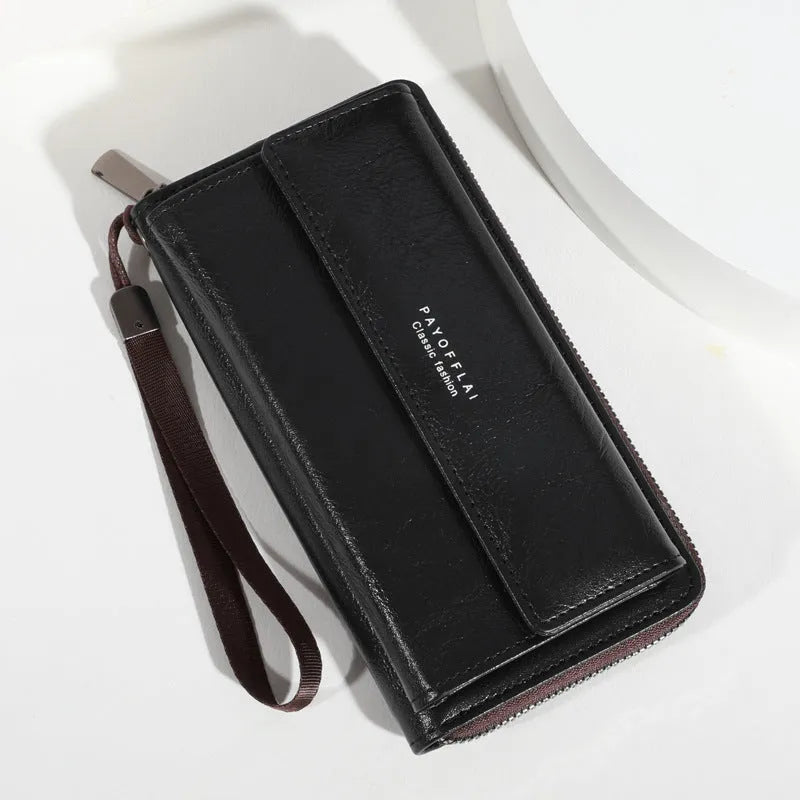 Men's black PU leather long wallet open showing multiple card slots and a zipped coin pocket.