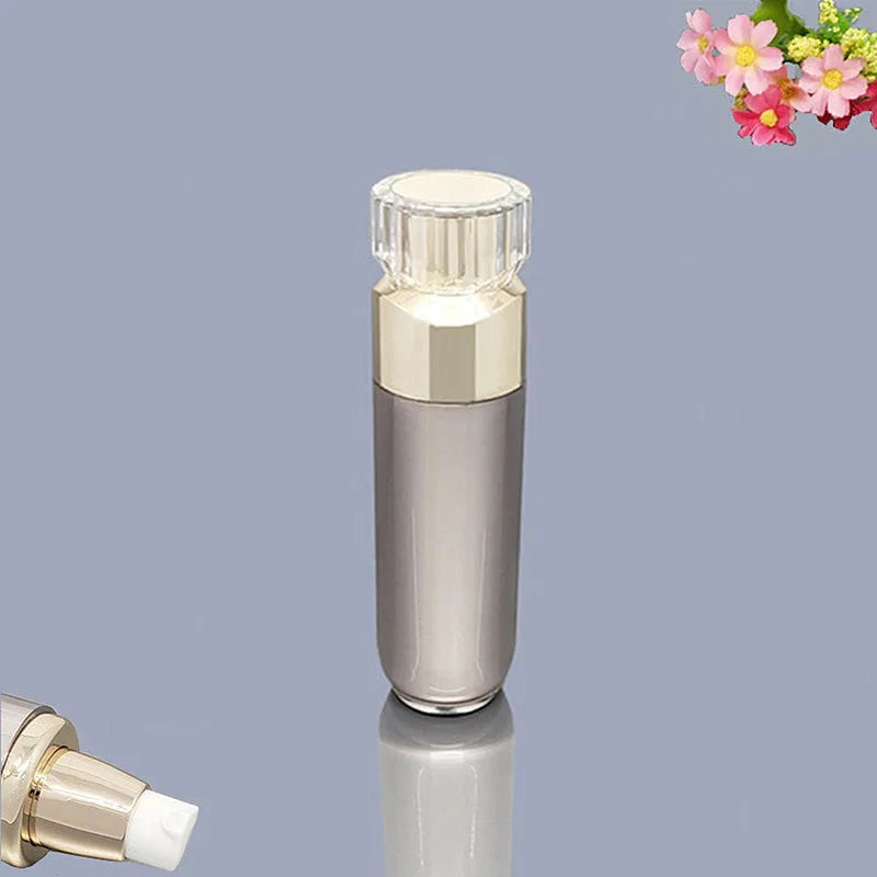 Acrylic cosmetics sub-bottling box with champagne gold and brushed white empty bottles in various sizes
