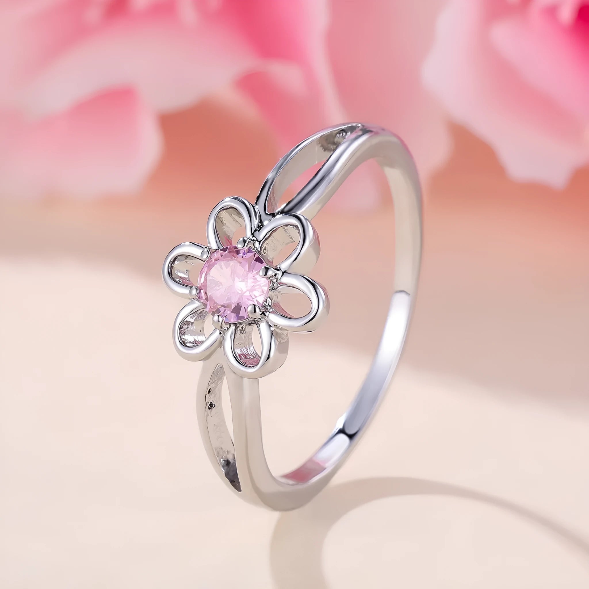 Women's hollow floral fashion ring in electroplated copper with a choice of metallic finishes.