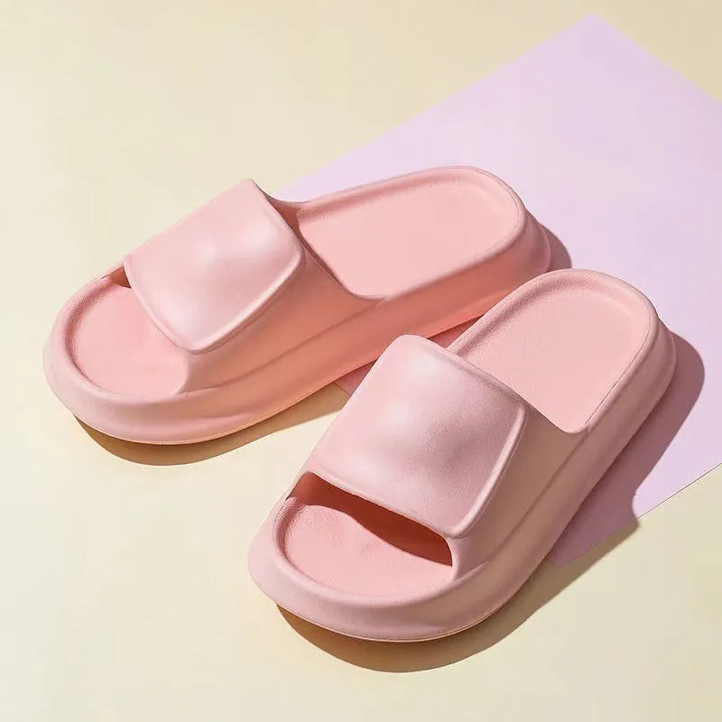 EVA flip-flop slippers with thick sole in multiple colours on a white background