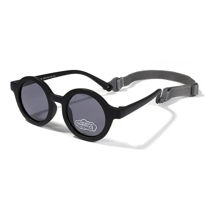 Children's round sunglasses for 0-3 year olds with UV400 protection, shown in a selection of colours.