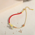 925 silver koi safety buckle bracelet with peace buckle and red rope detailing