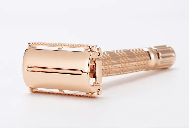 Rose gold chrome plated double edge safety razor with butterfly head in travel storage box with mirror