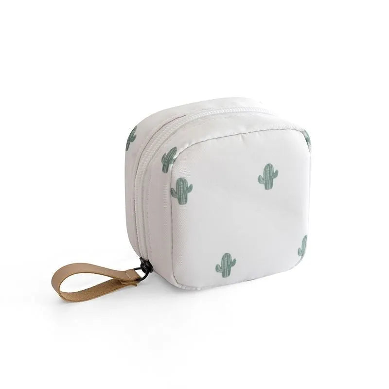 Cloth fabric cube-shaped makeup storage bag in blue, pink, white, and pink/white colour options.