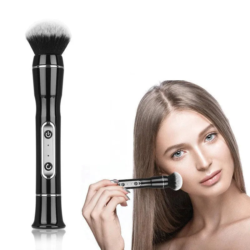 Electric makeup brush with white body, fibre wool bristles, and two rounded brush heads including foundation and blush applicators