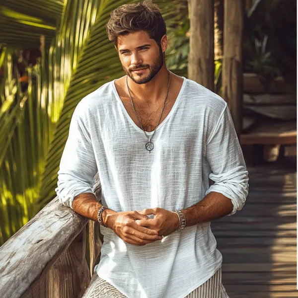 Beige long-sleeved V-neck t-shirt in slim fit made from hemp blend fabric.