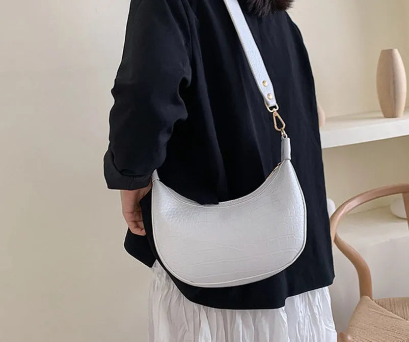 Fairy dumpling bag in PU with crossbody strap, 24cm wide, available in multiple colours