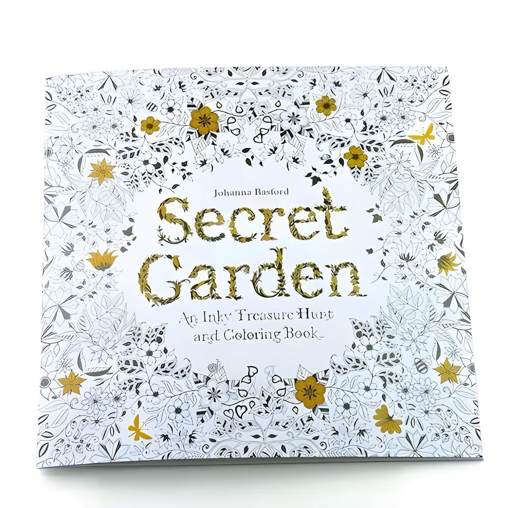 Adult DIY colouring book Secret Garden model open to a detailed black and white cartoon illustration page.
