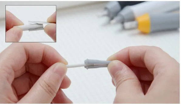 Black and gray electric eraser with plastic body, 166x15 mm, on a white background