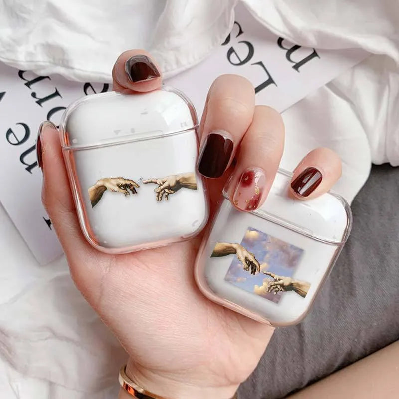 Transparent plastic AirPods protective cover case shown on Apple charging case
