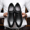 Men's black leather toe cap formal shoes with rubber sole on white background
