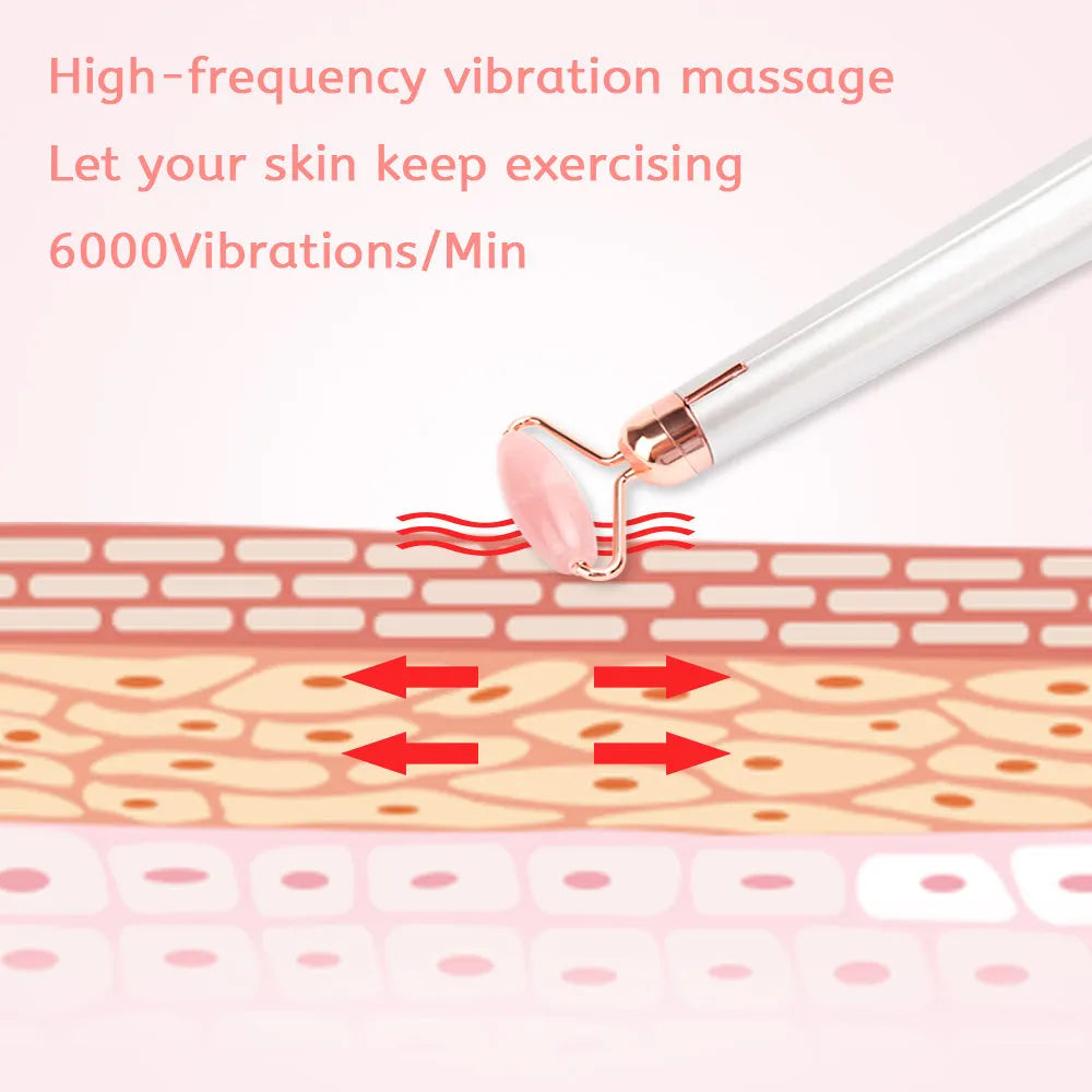 Electric vibrating rose quartz facial roller with under eye press on pink background