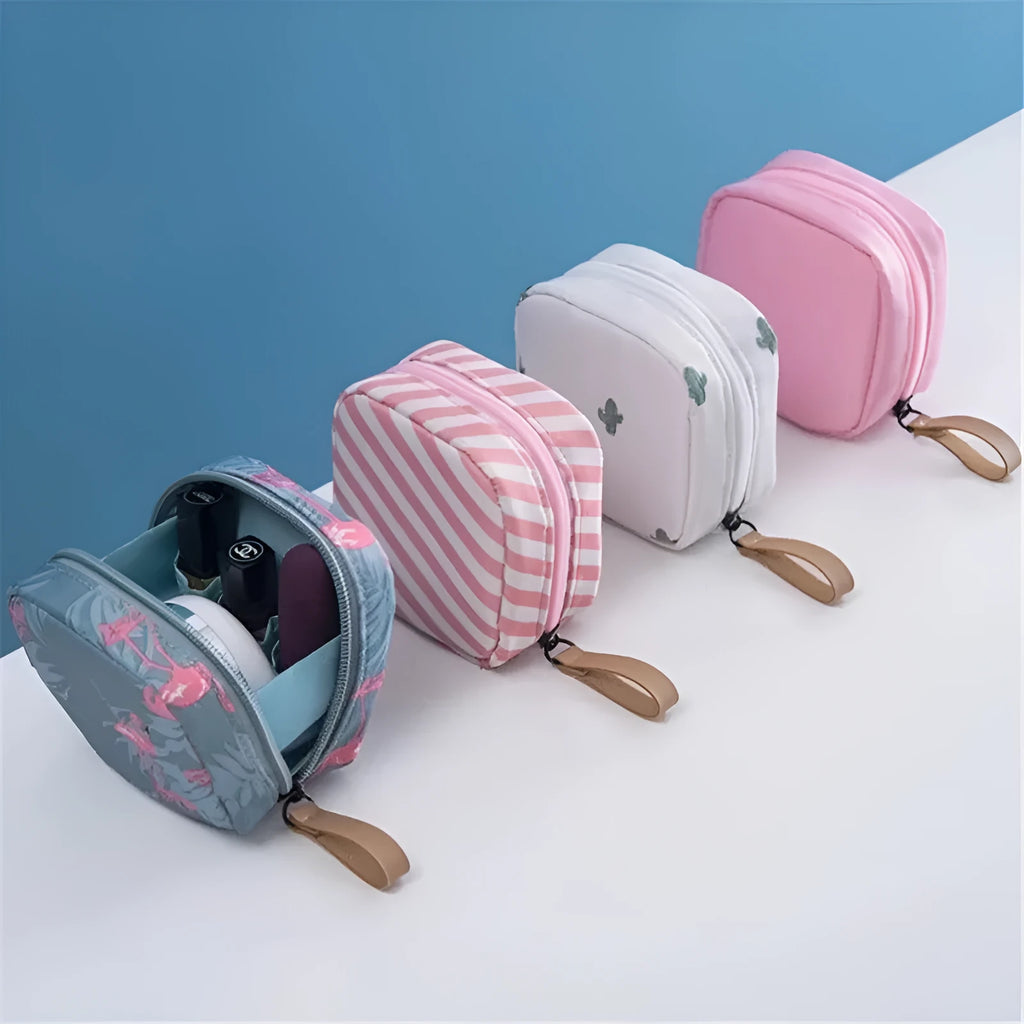 Cloth fabric cube-shaped makeup storage bag in blue, pink, white, and pink/white colour options.