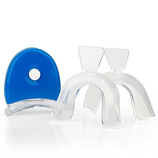 Advance Teeth Whitening LED Kit with white mouth trays and blue LED light unit