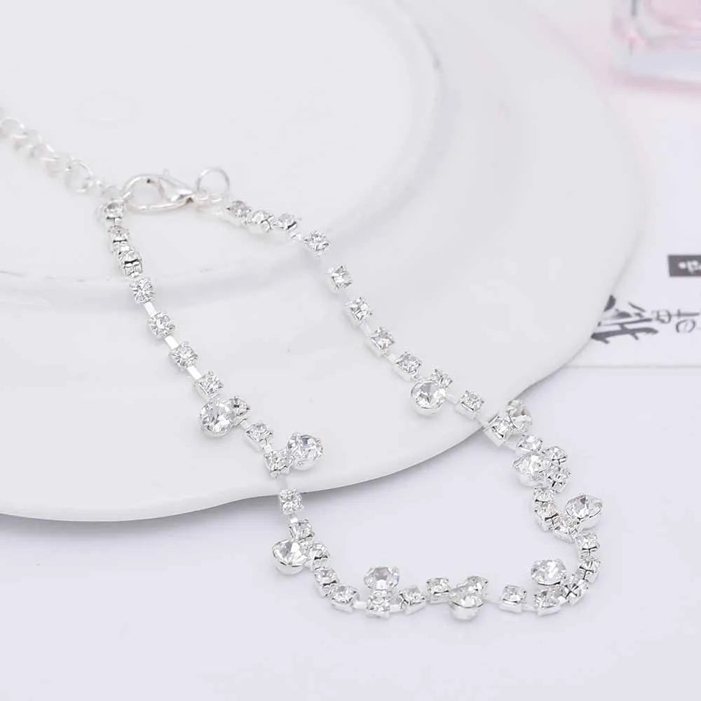 Women's silver alloy water drop tassel anklet with adjustable chain and artificial gem inlay