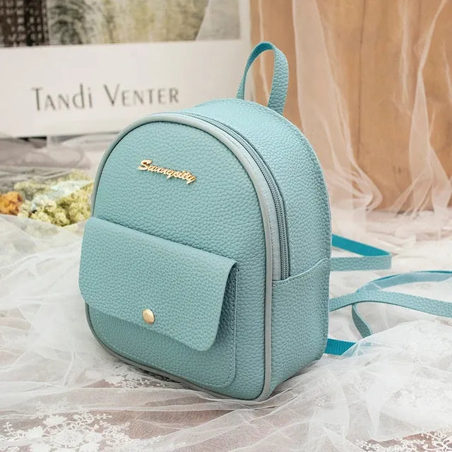 Women's small black PU backpack purse with letter design and zipper closure