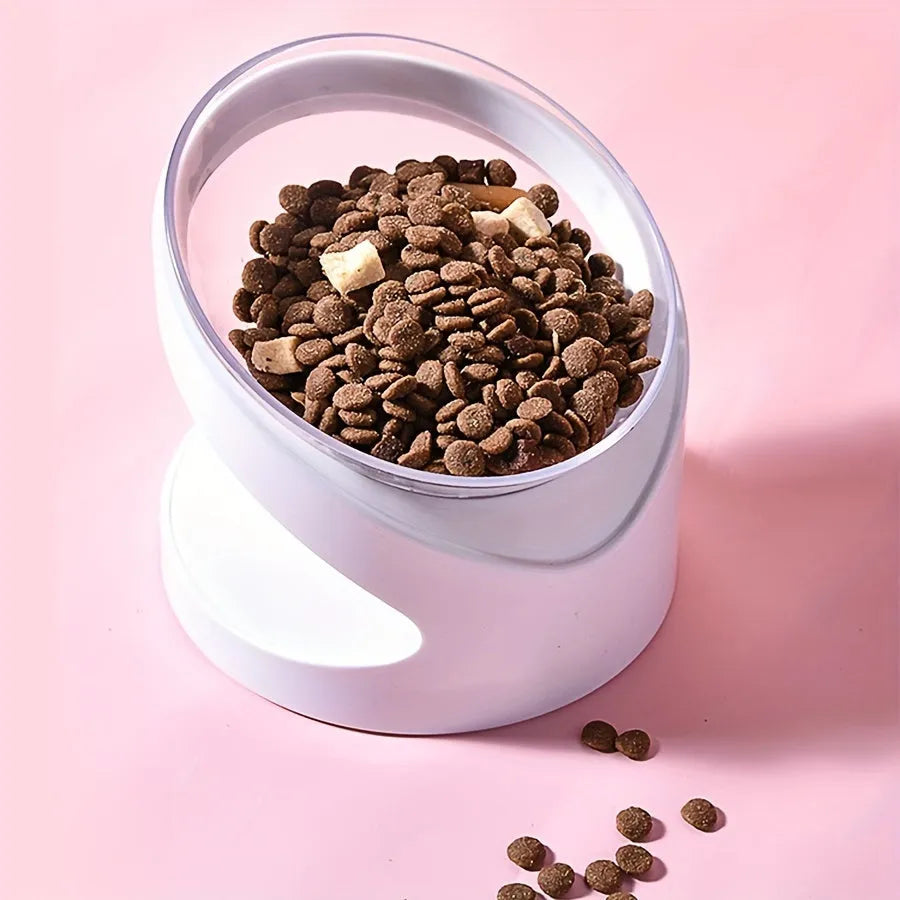 White clear plastic elevated cat food bowl with tilted anti-vomit design on a raised stand.