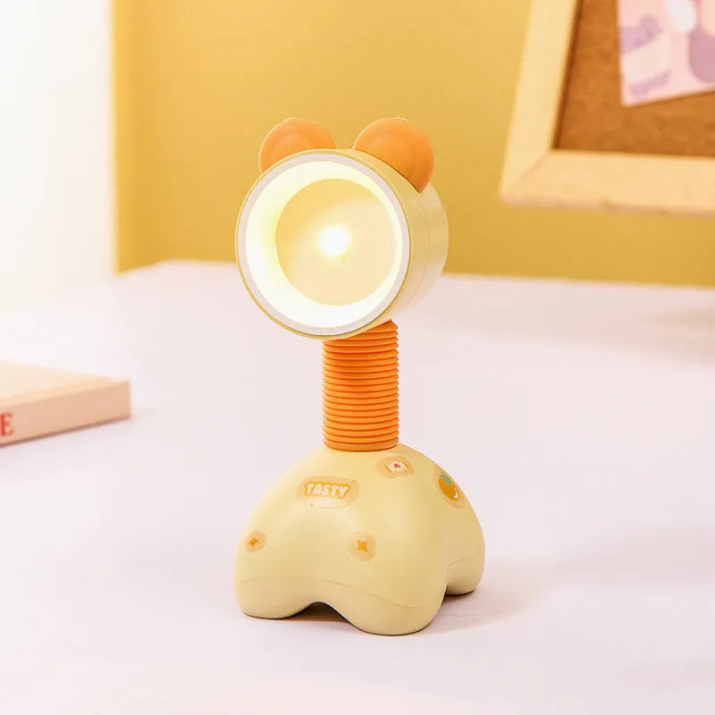 Cartoon animal magnetic night lamp with adjustable head on metallic surface