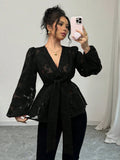 Women's black hollow out embroidery polyester shirt with V-neck and long sleeves, front view