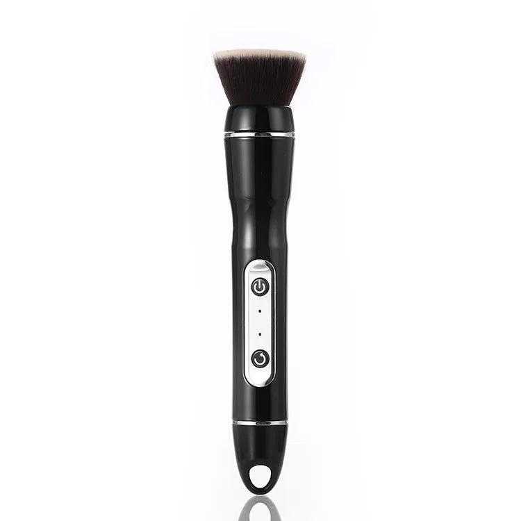 Electric makeup brush with white body, fibre wool bristles, and two rounded brush heads including foundation and blush applicators