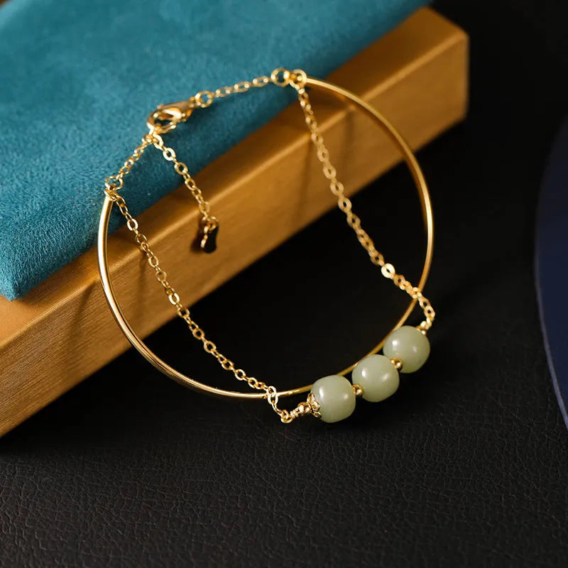 Jade lucky beads bracelet with gold inlay treatment in women's faux two-piece style