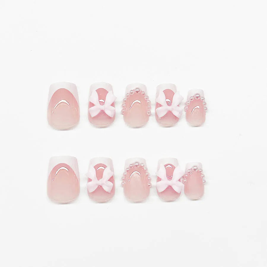 Short square white French manicure nail art set with bow designs and gel adhesive