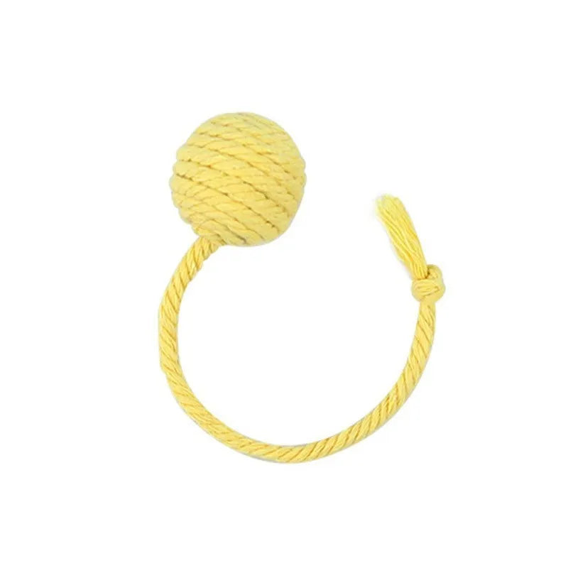 Colourful cat toy ball with rope and built-in bell available in green pink purple yellow for kittens
