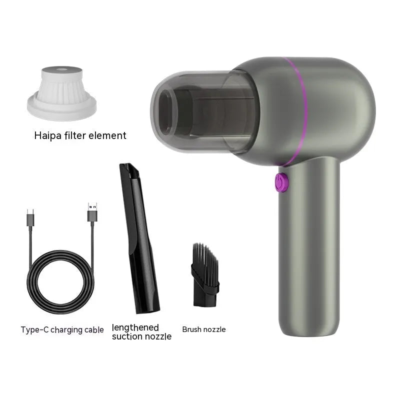 Grey XC-06 handheld portable car vacuum cleaner with brush nozzle and extended nozzle.