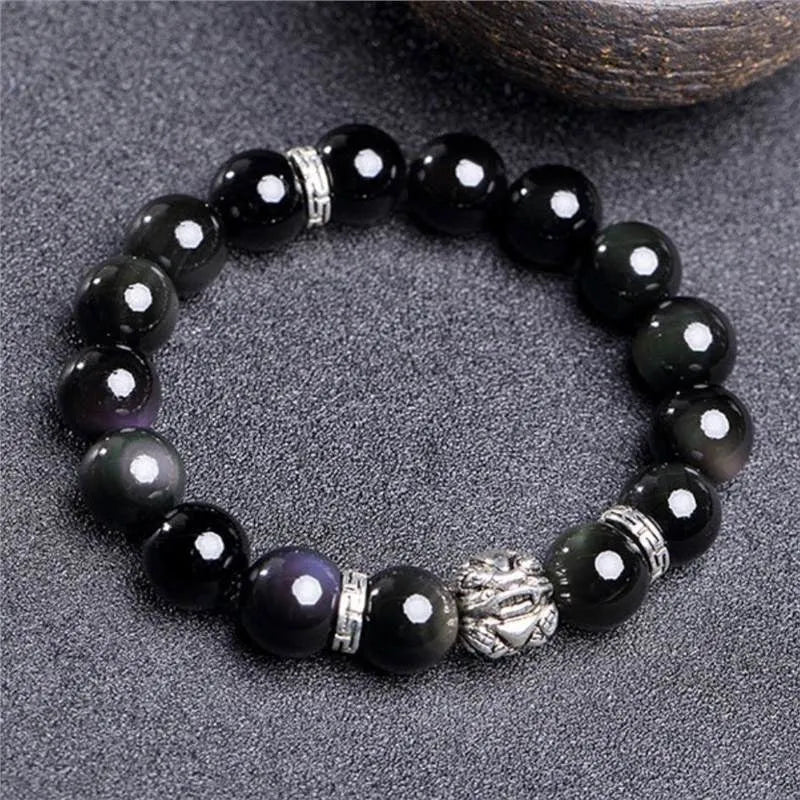 Obsidian bracelet with silver 999 detail and lucky colour eye beads in 10mm and 12mm sizes.