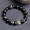 Obsidian bracelet with silver 999 detail and lucky colour eye beads in 10mm and 12mm sizes.