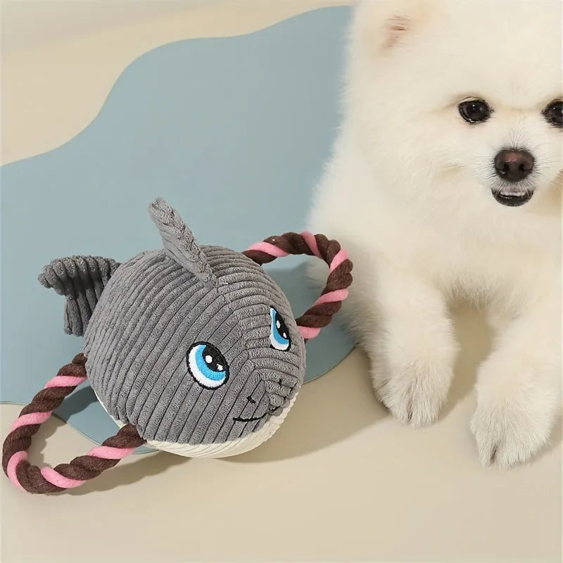 Grey turtle-shaped plush dog chew toy with textured knots on its shell.