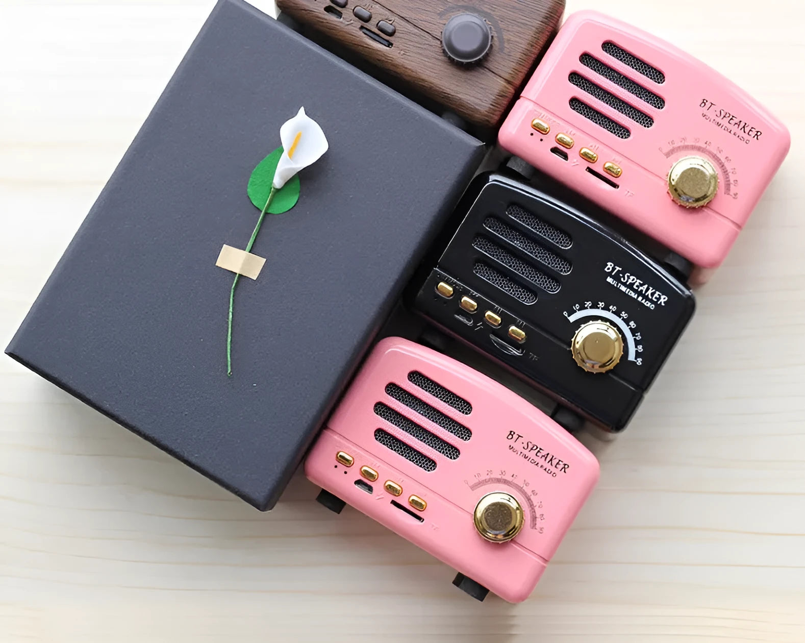 Vintage wood style Bluetooth speaker in pink, black or wood grain finish
