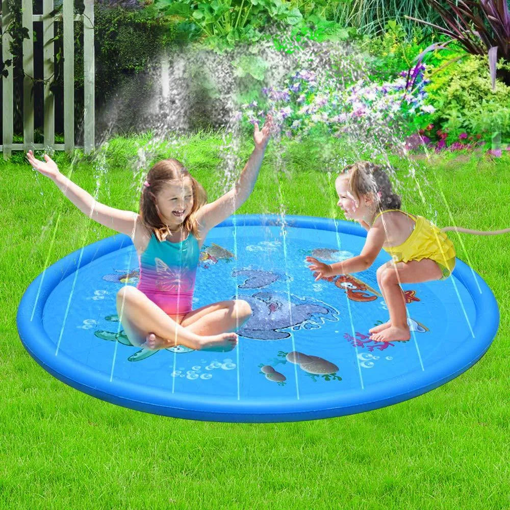 Blue PVC children's water spray play mat with marine animal designs, shown connected to a garden hose