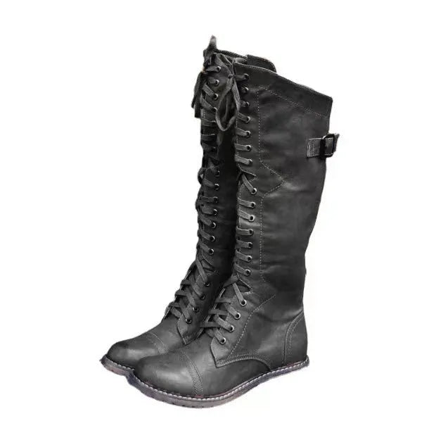 Women's black chunky heel high leg ankle boots with round toe and cotton lining on a white background.