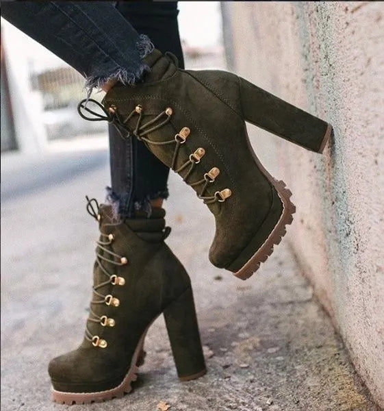 Women's suede ankle boots with a thick high heel in army green, shown from the side.