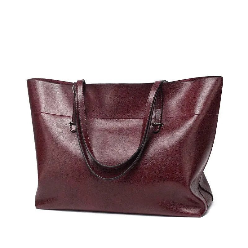 Wax cowhide leather handbag with horizontal design and two compartments